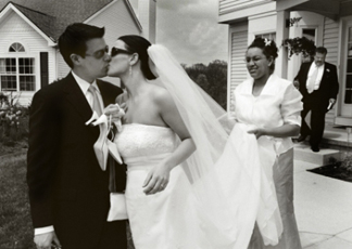 You own the rights to all the wedding photographs shot by this Michigan wedding photojournalist