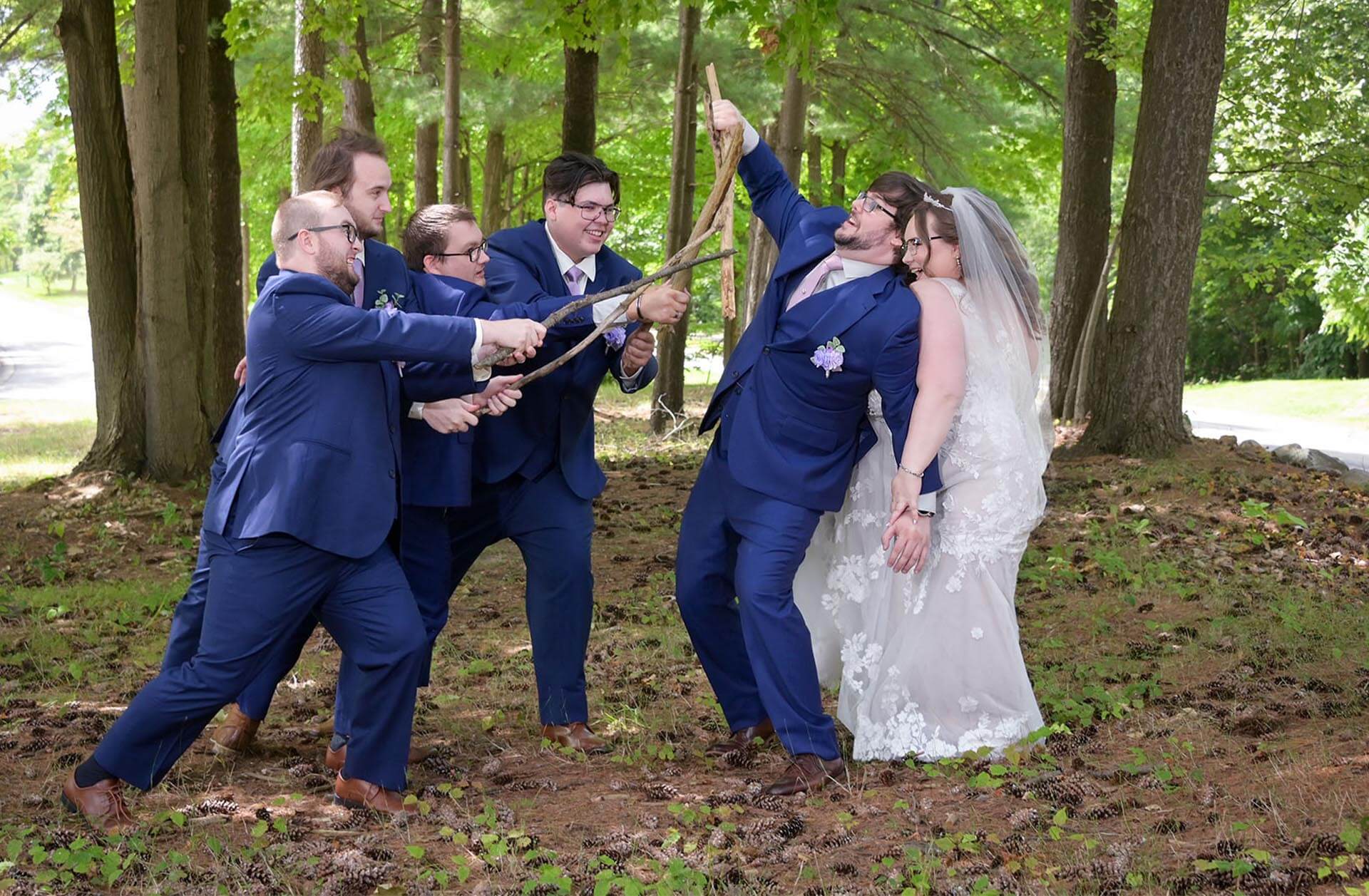 Wedding party starts a fake fight next to their wedding venue, 2 Gather More at Auburn Hills, MI. I love it when wedding parties start to play.