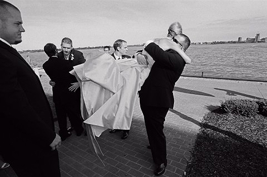 You own the rights to all the wedding photos shot by this Michigan wedding photojournalist
