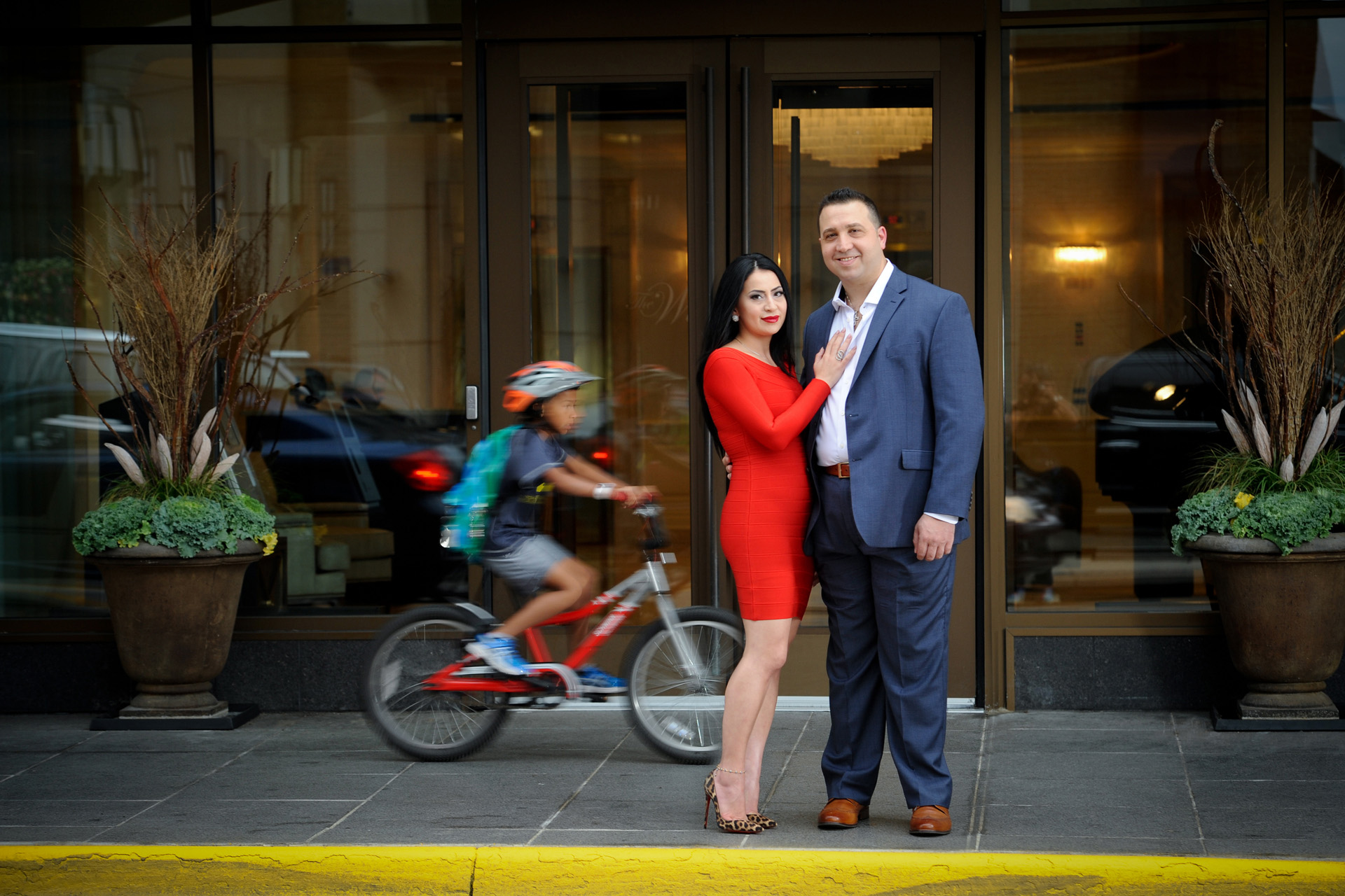 Photographer photographs an engagement session with a more formal and classic couple wanting photos in Birmingham, Michigan.