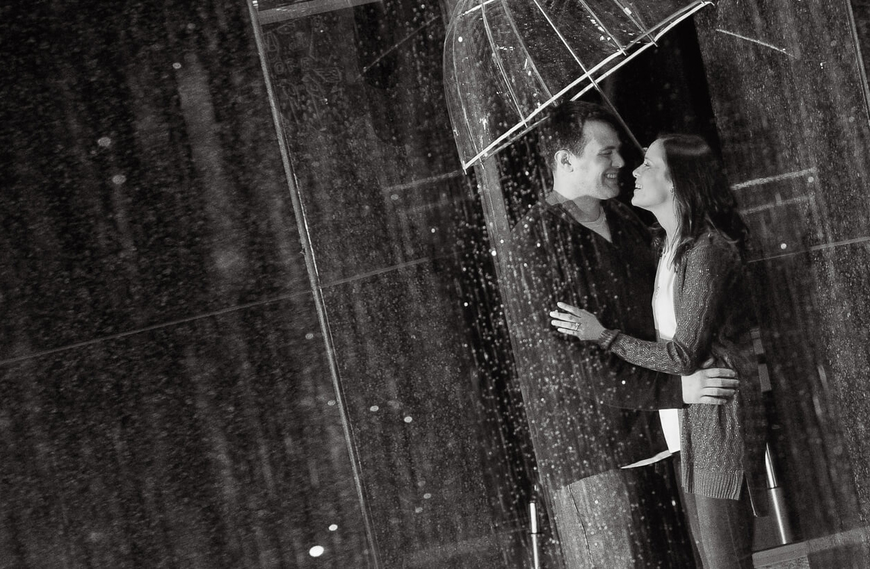 Classic, yet unique engagement photo by a fountain Detroit, Michigan to give them a classic look.