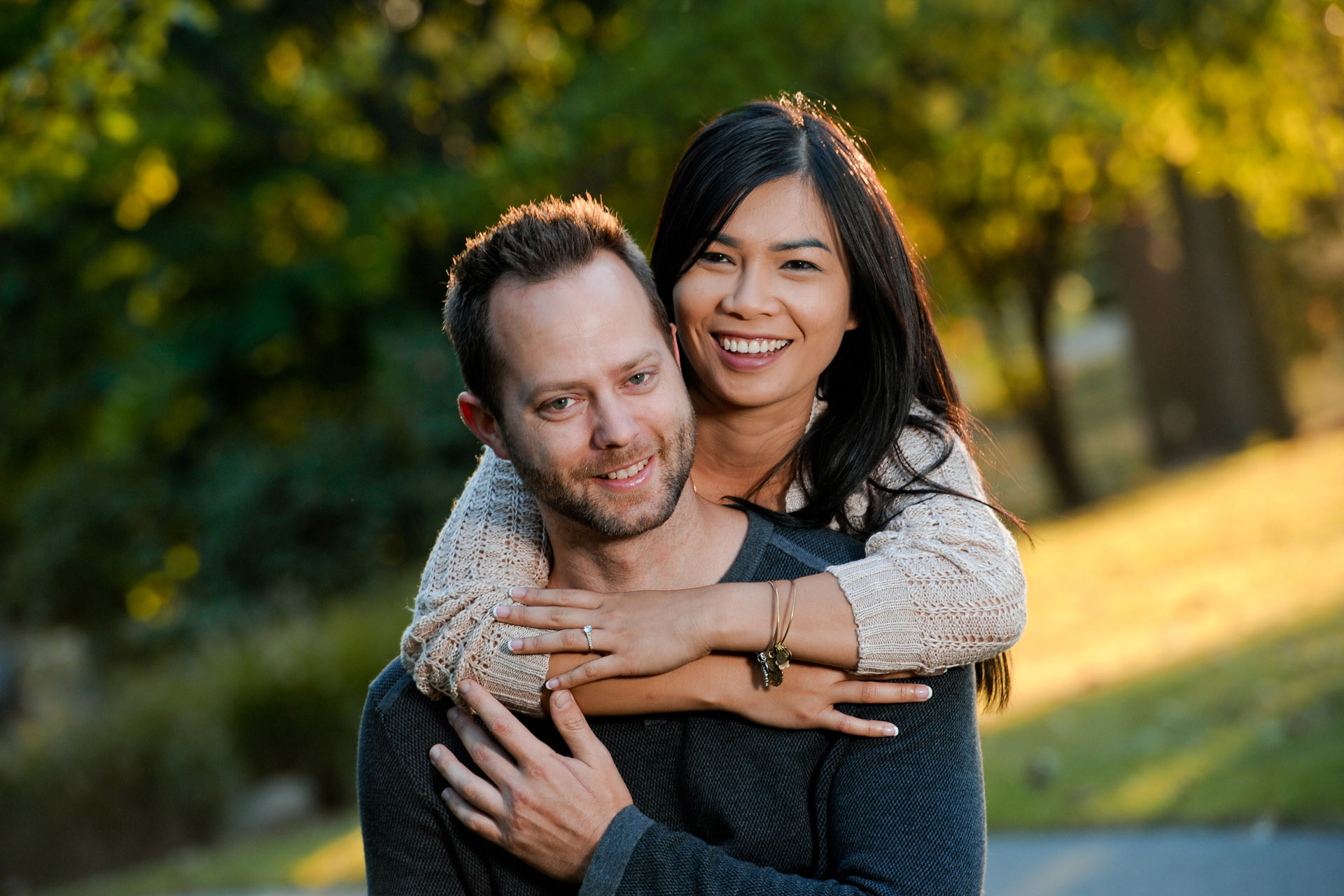 Engagement pictures during golden hour captures the fun, newly engaged vibe of this couple in the metro Detroit, Michigan area.