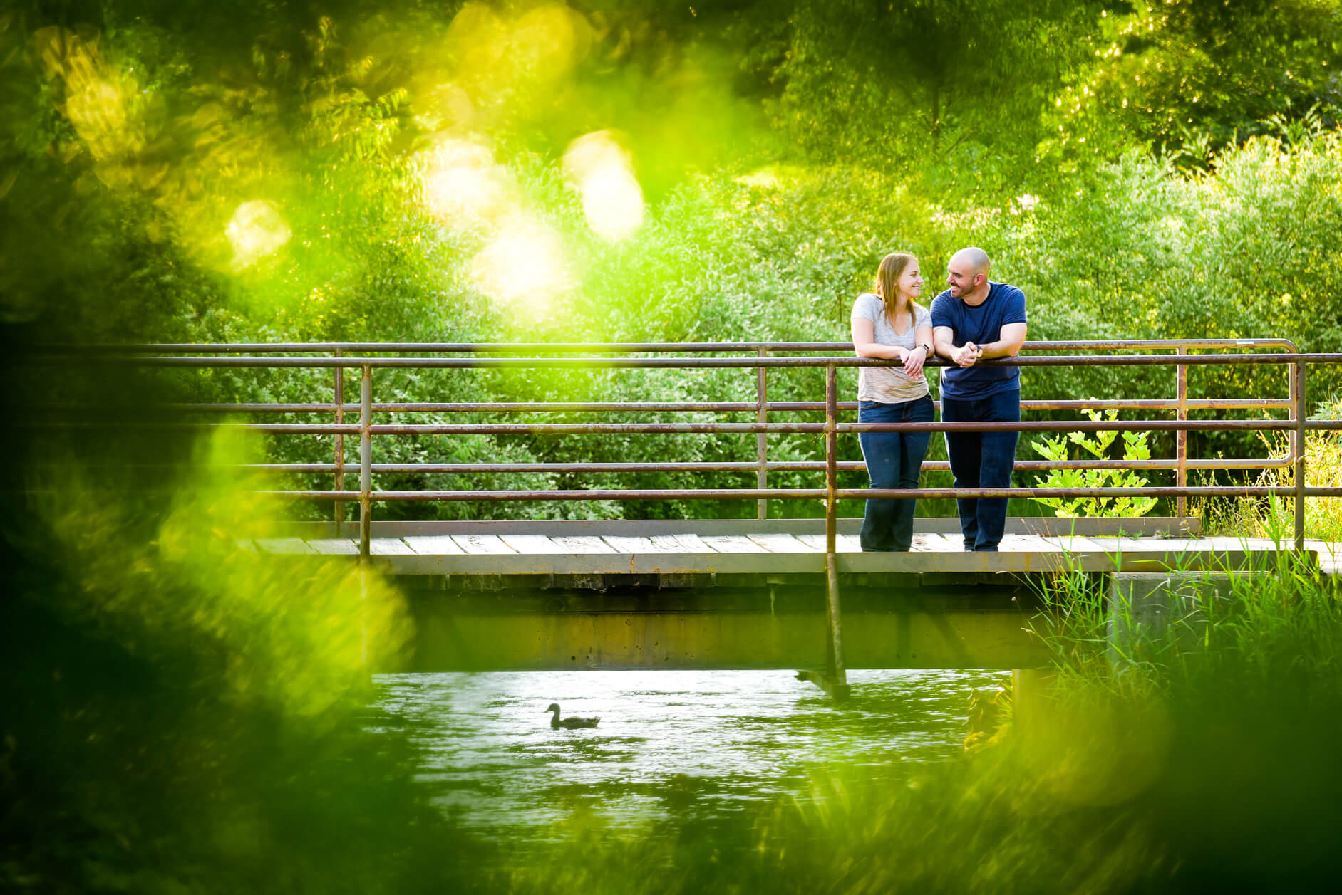 Newly engaged couples like these two in a park along the river in metro Detroit, Michigan.