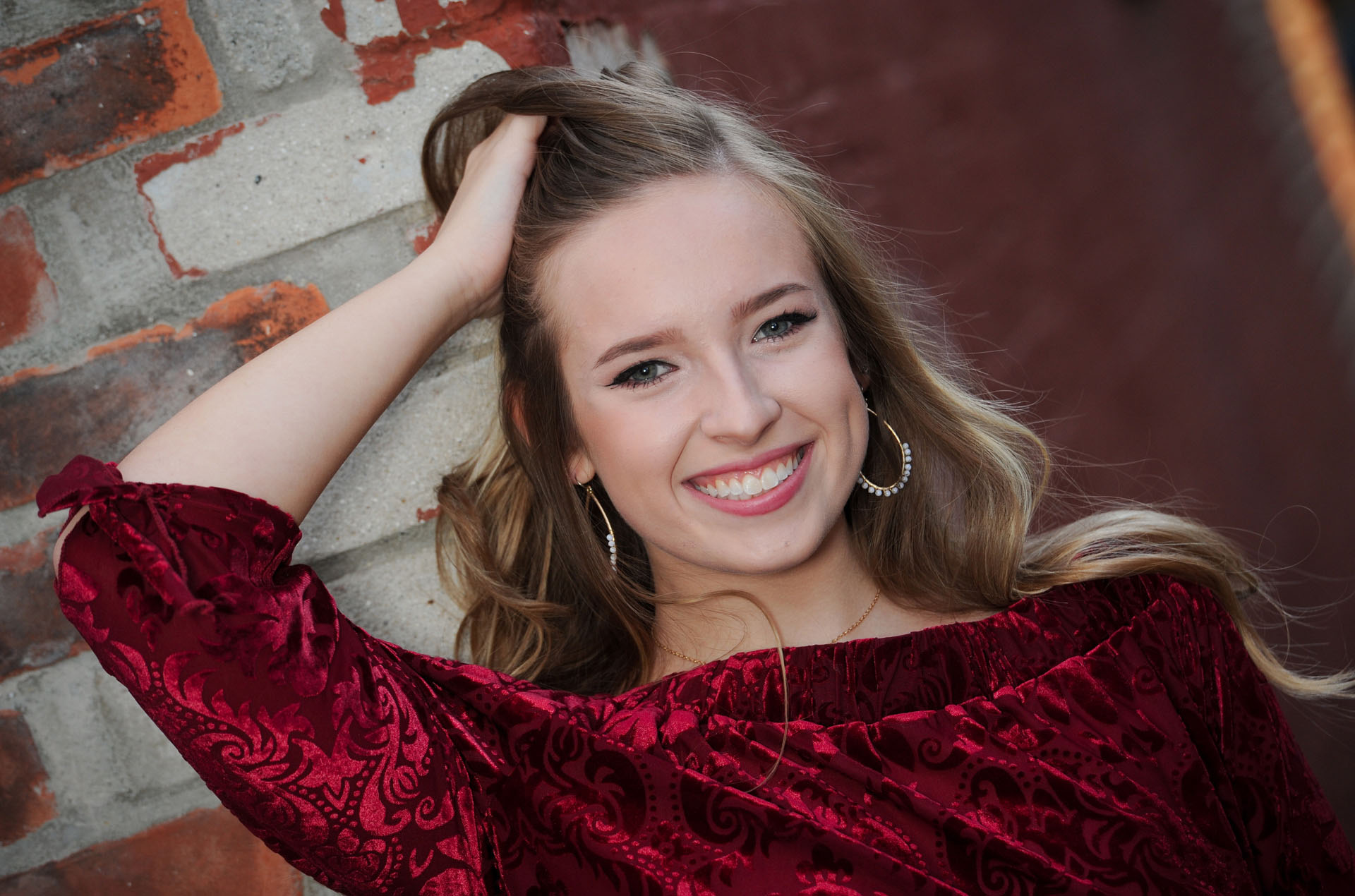 Best Oakland County Michigan lifestyles photographer photographs a children's and kids session with a more formal and classic couple wanting photos in the city of Birmingham, Michigan in spring.