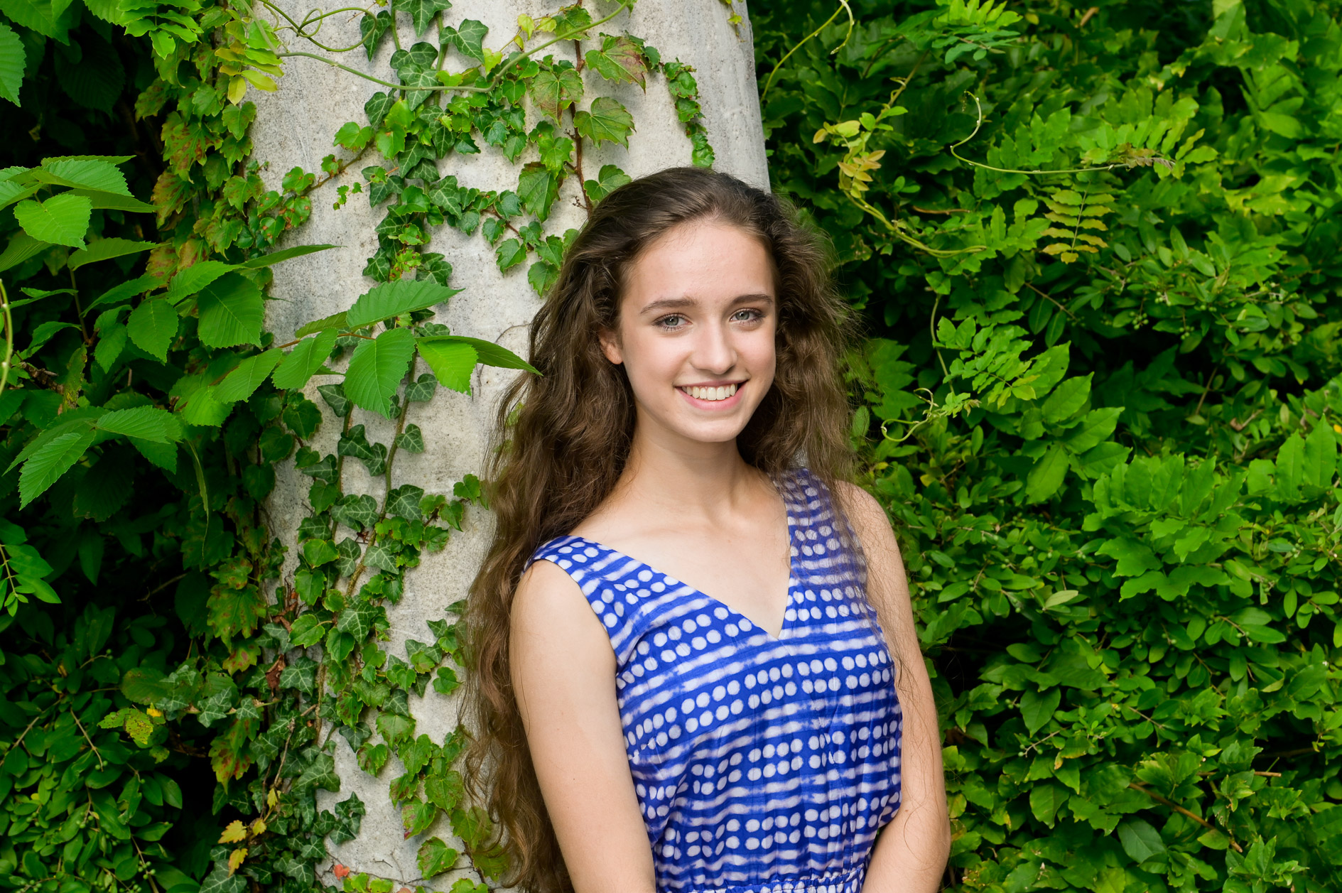 Settling into the vines for her classic, senior photo.