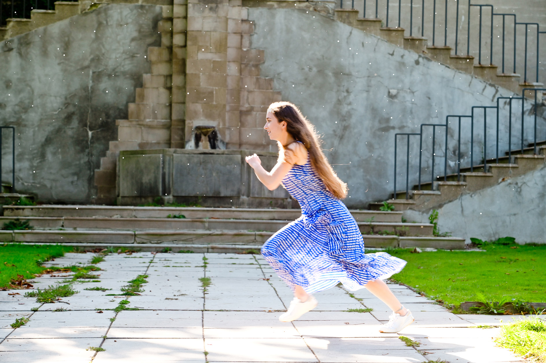 Rachel's back to a quick motion filled sprint across the plaza.
