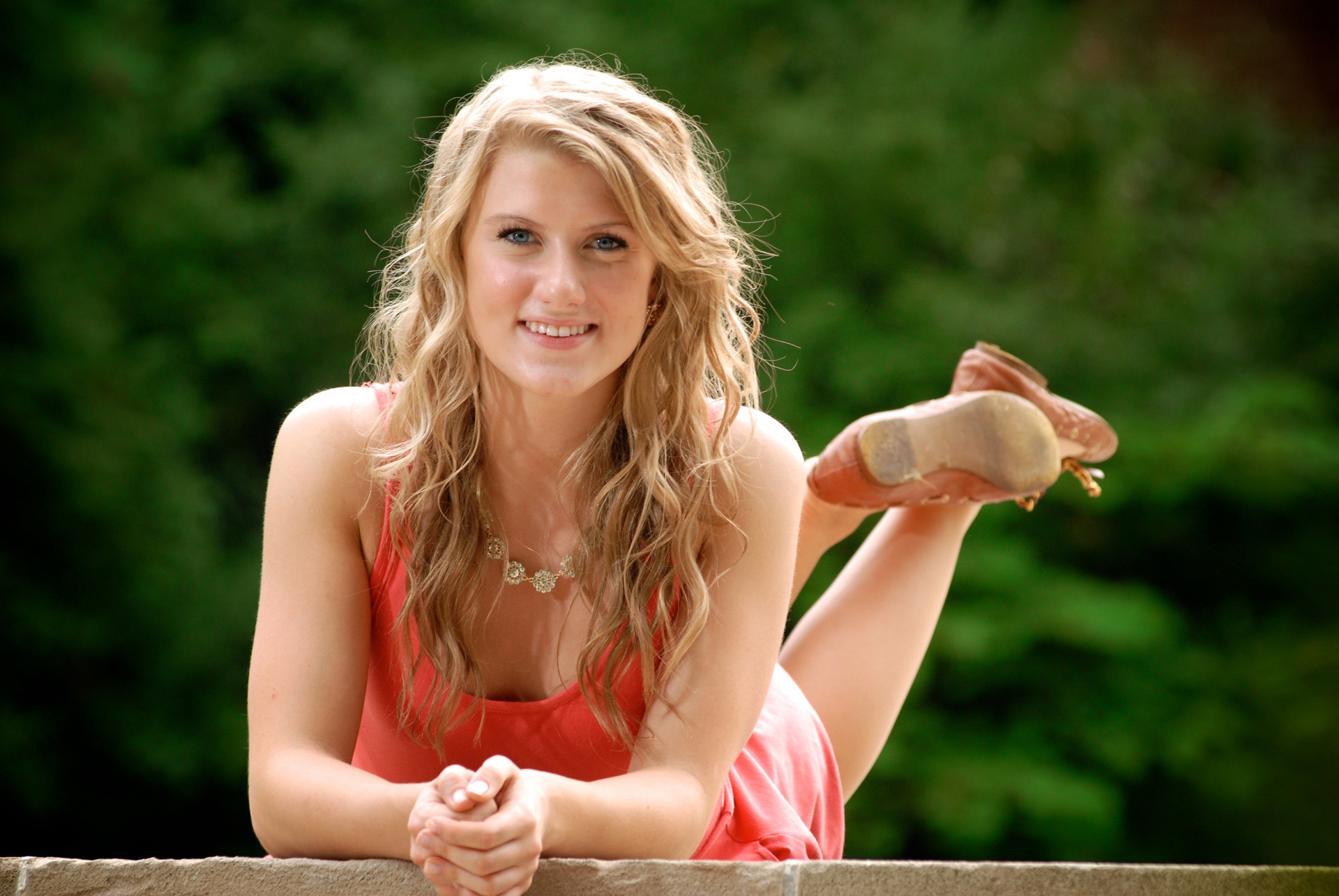 Cranbrook School in Bloomfield, Michigan senior photographer shows a high school senior in fantastic light for a sweet senior shoot.