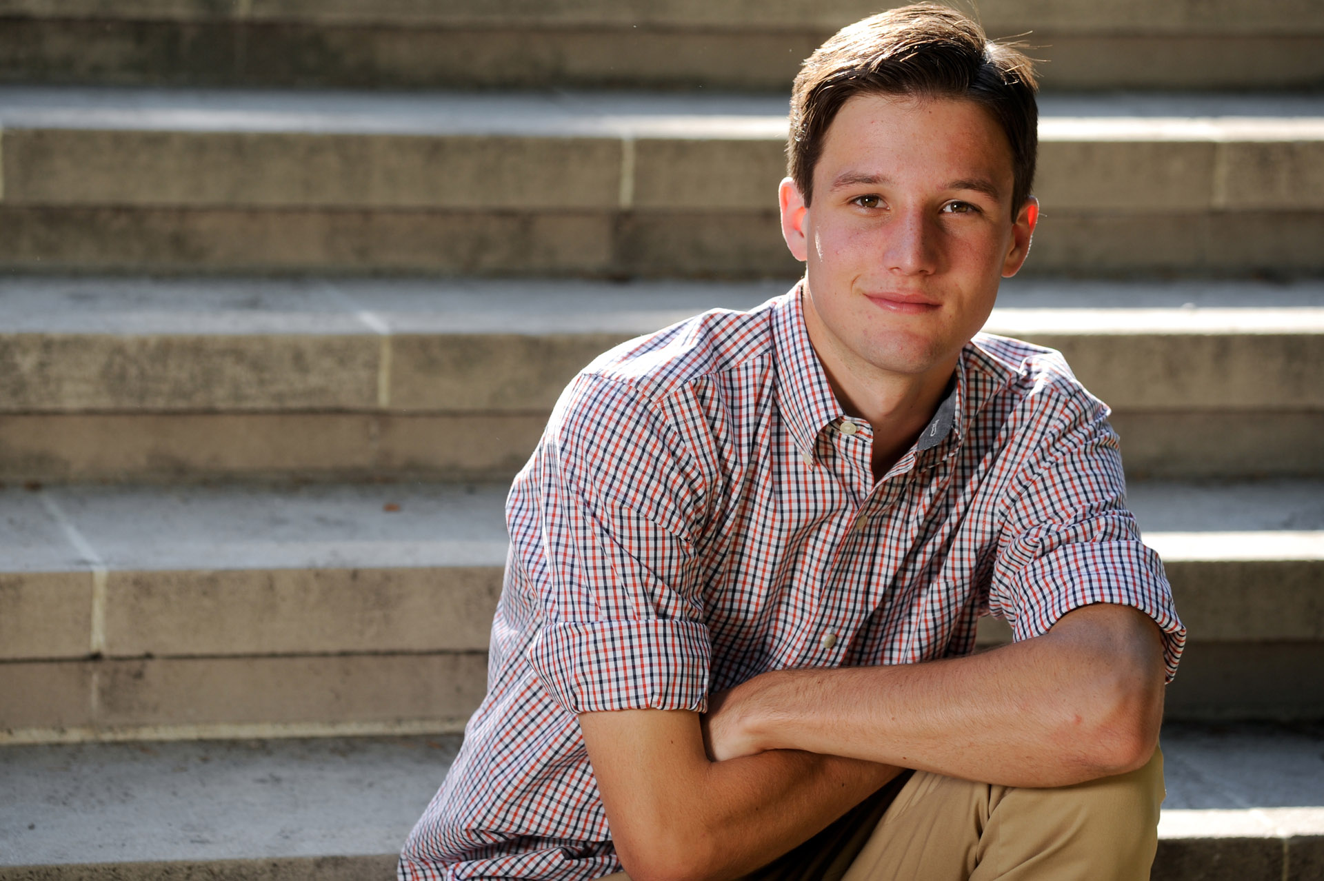 Cranbrook School in Bloomfield, Michigan senior photographer's photo taken of the high school senior on one of the many staircases at the Cranbrook School in Bloomfield, Michigan.