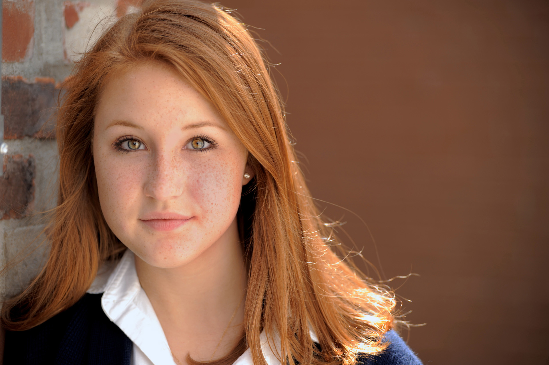 Cranbrook School in Bloomfield, Michigan senior photographer's photo portrait of the high school senior on the grounds of the private school campus at the Cranbrook School in Bloomfield, Michigan.