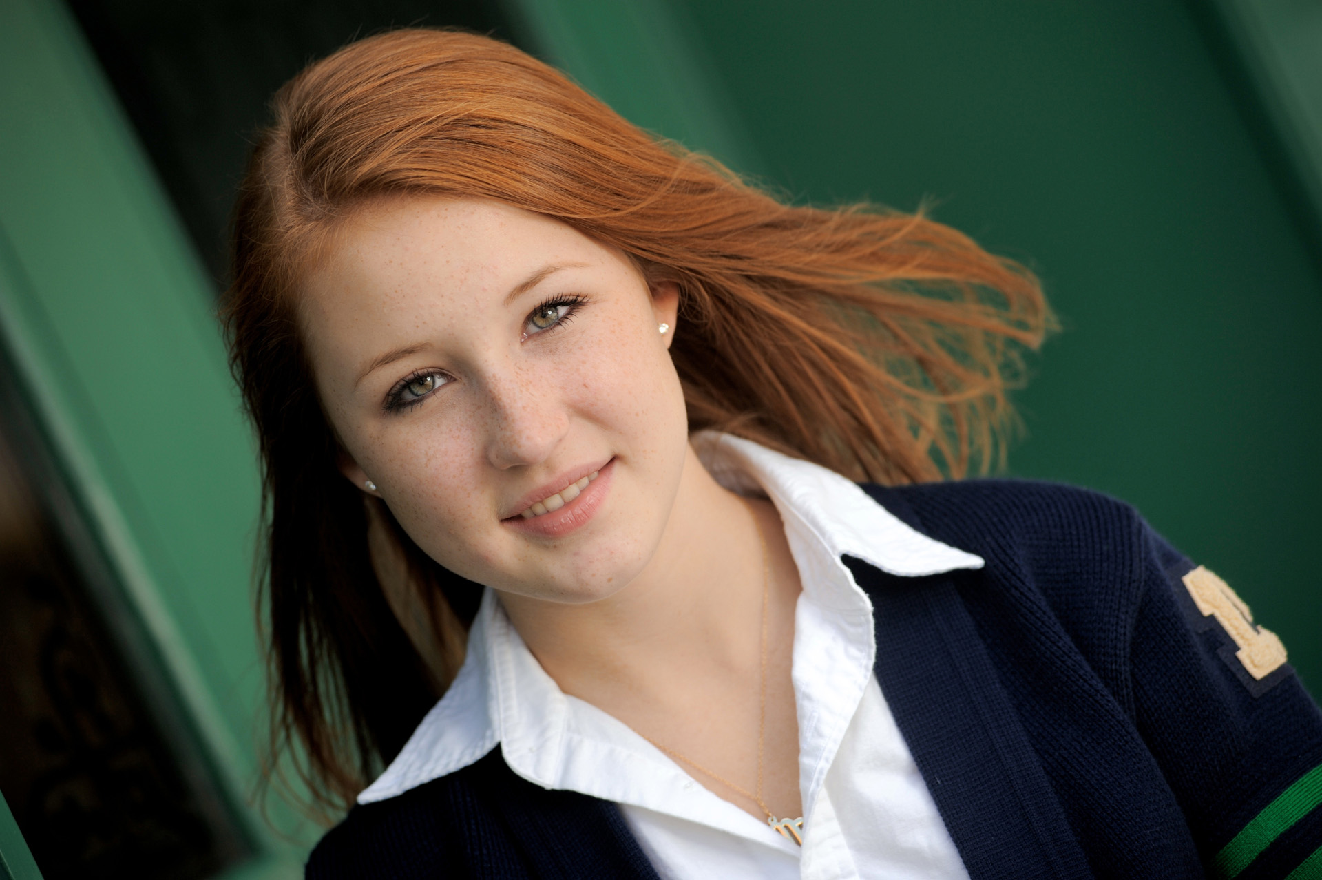 Cranbrook School in Bloomfield, Michigan senior photographer's photo of a Cranbrook student in one of the many alleys on the private school's campus for her senior pictures at Cranbrook School in Bloomfield, Michigan.
