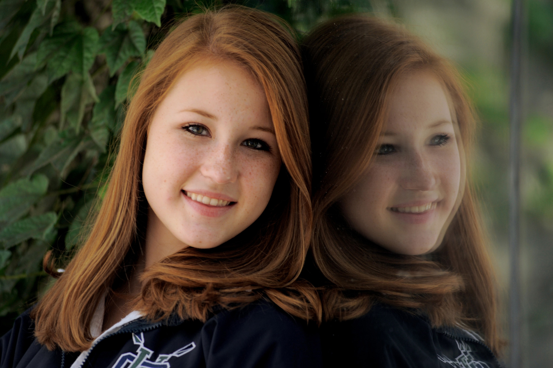 Cranbrook School in Bloomfield, Michigan senior photographer's photo of her reflection during a photography session at the private school's campus for her senior pictures at Cranbrook School in Bloomfield, Michigan.