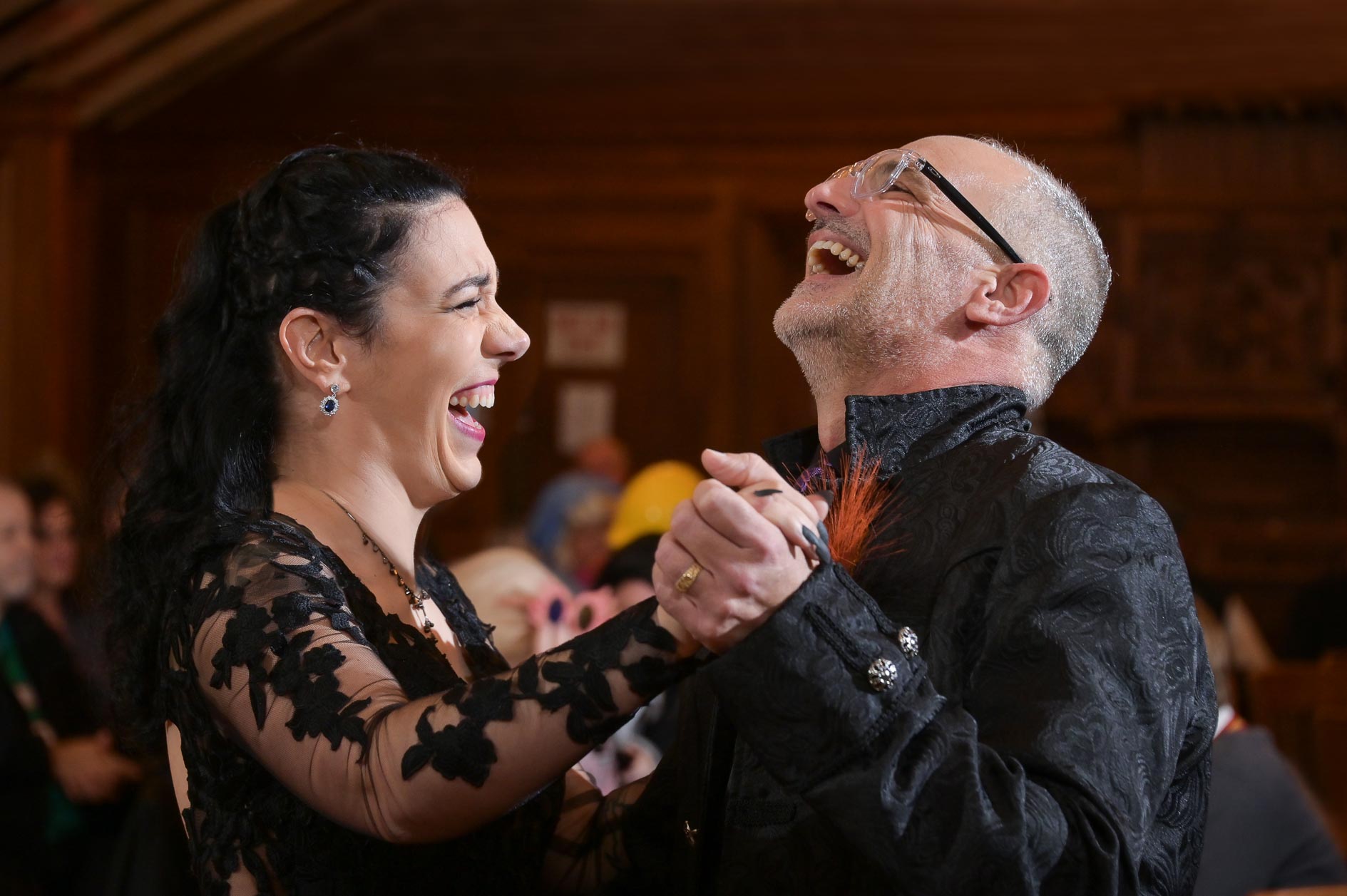 Bride and her father dance together at a Halloween themed wedding at Canterbury Village in Lake Orion, Michigan.