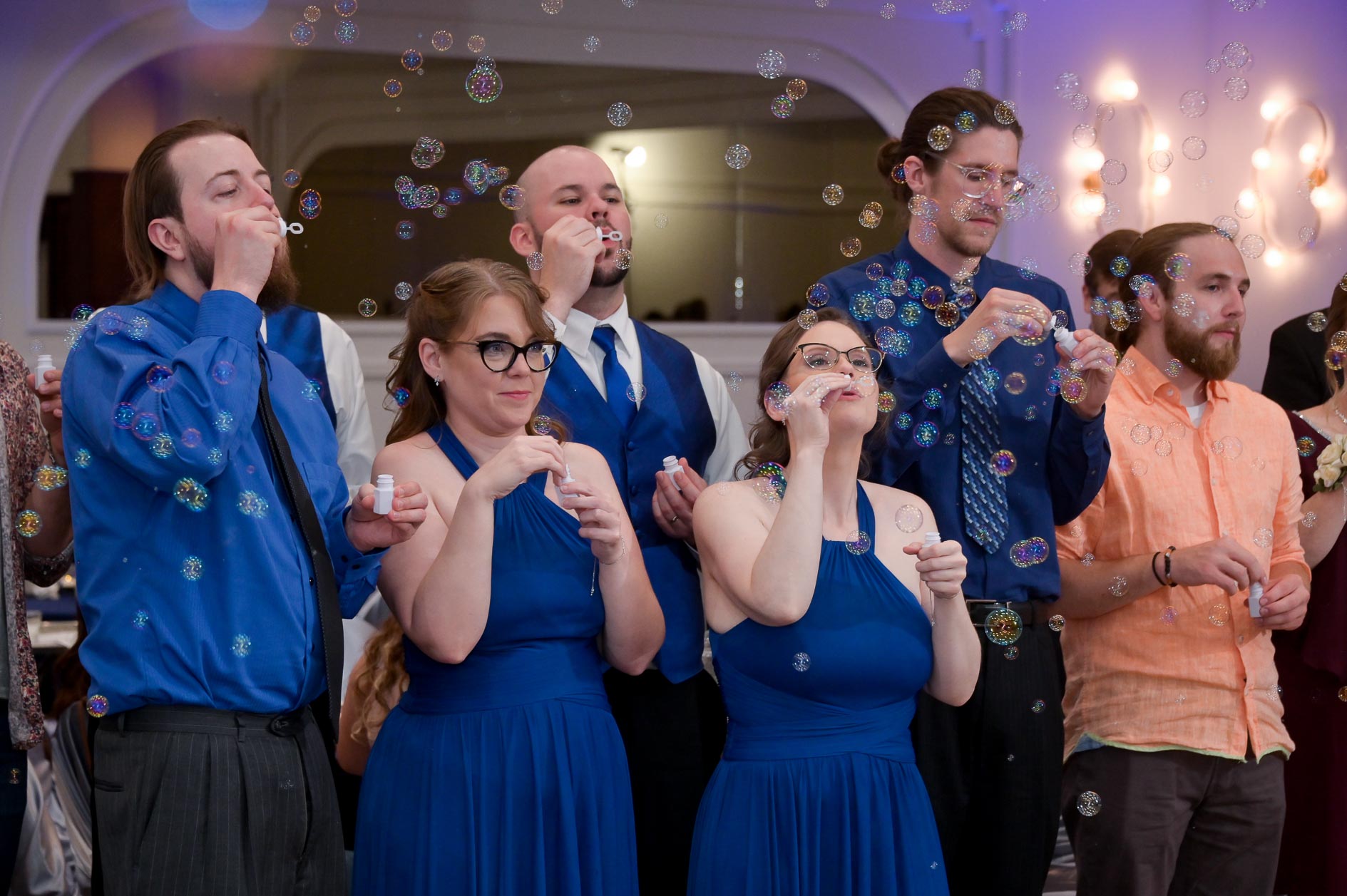 The bridal party blows bubbles during the first dance at Villa Penn Banquet in Sterling Heights, Michigan.