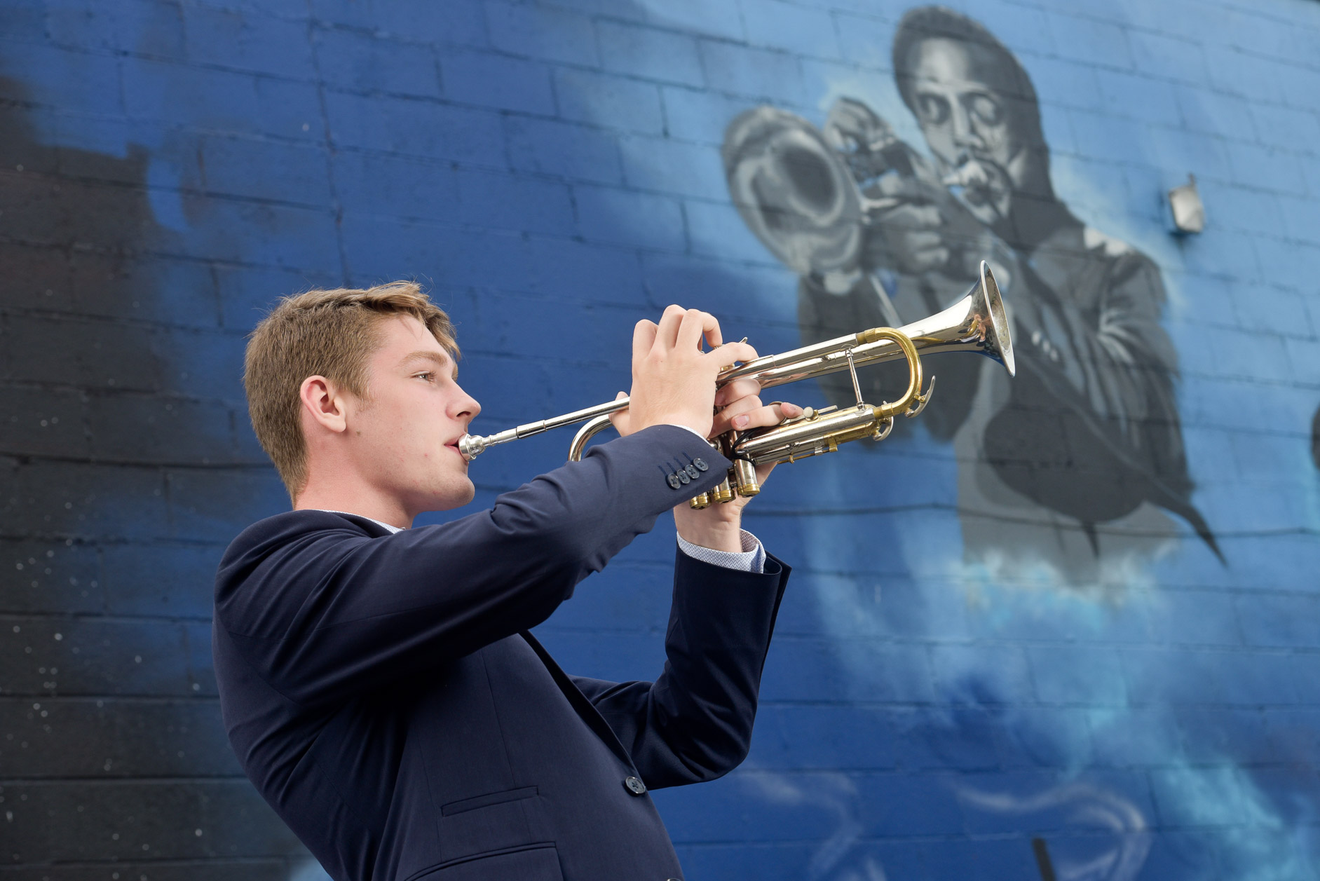 Troy High School senior's photo taken downtown Detroit, Michigan to show off his trumpet playing skills.