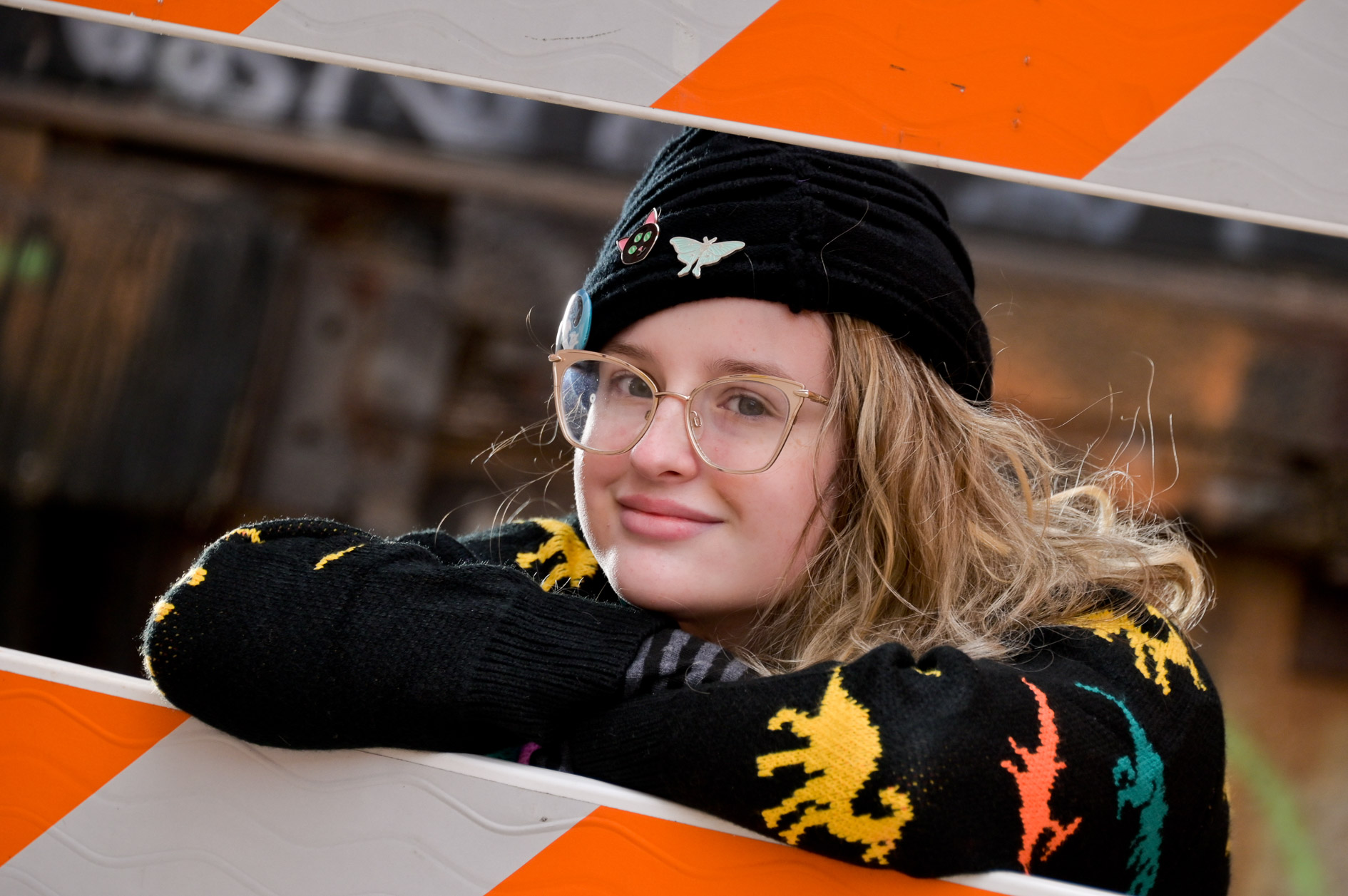 Artsy High school senior picture poses with found art in Detroit, Michigan.