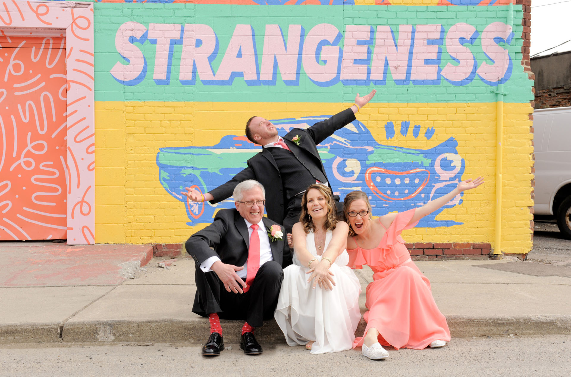 Best Detroit lifestyles photographer's fun and candid family photos of a long time client at this Metro Detroit and Detroit, Michigan street art and murals.
