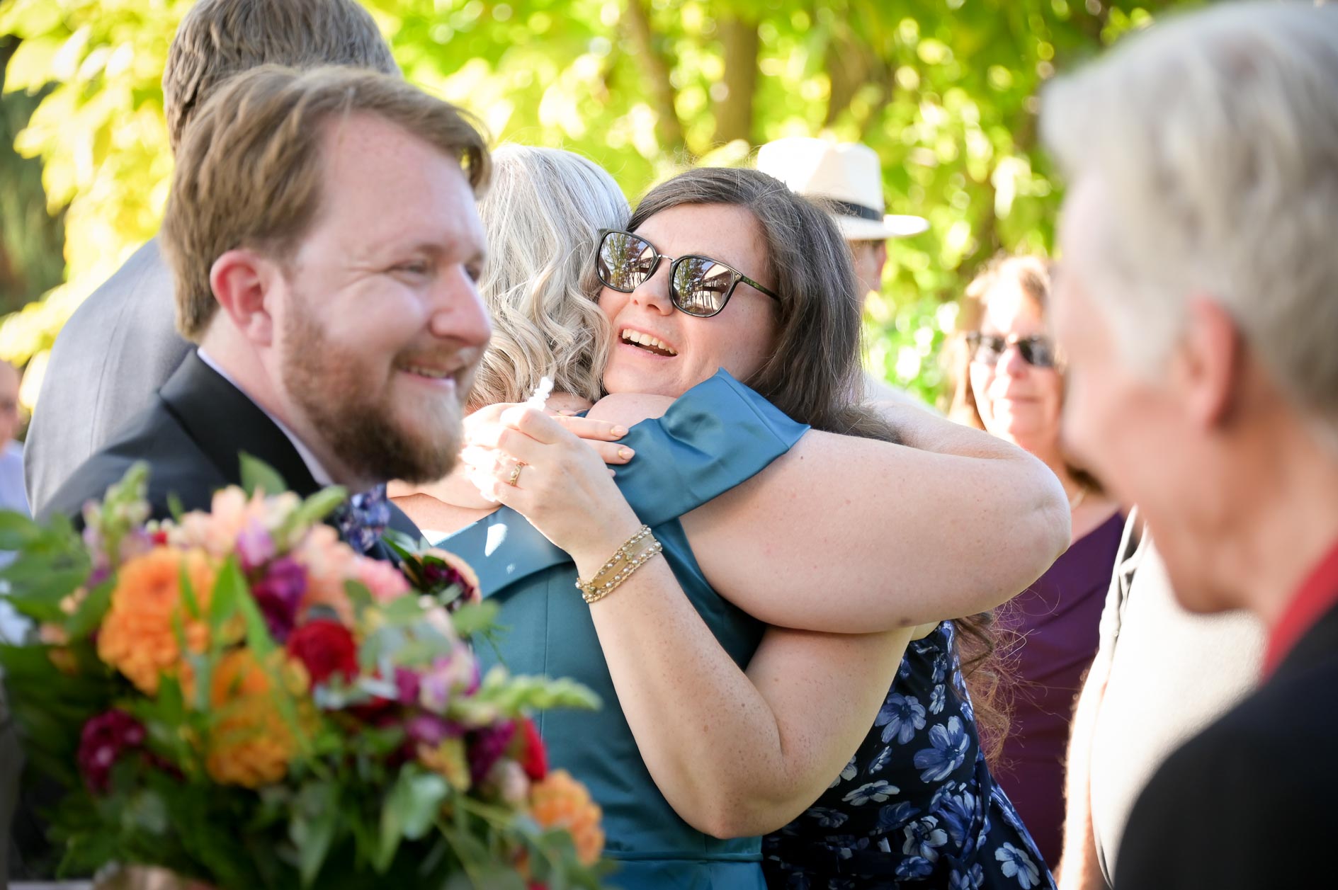 Guests going through the receiving line at a lakeside wedding in, Michigan.