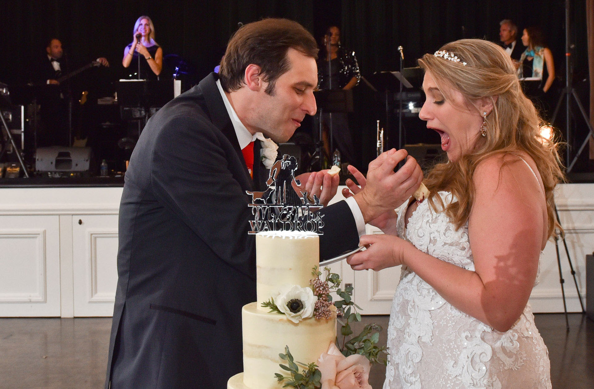 The groom accidentally drops the wedding cake down the bride's dress at The Community House in Birmingham, Michigan.