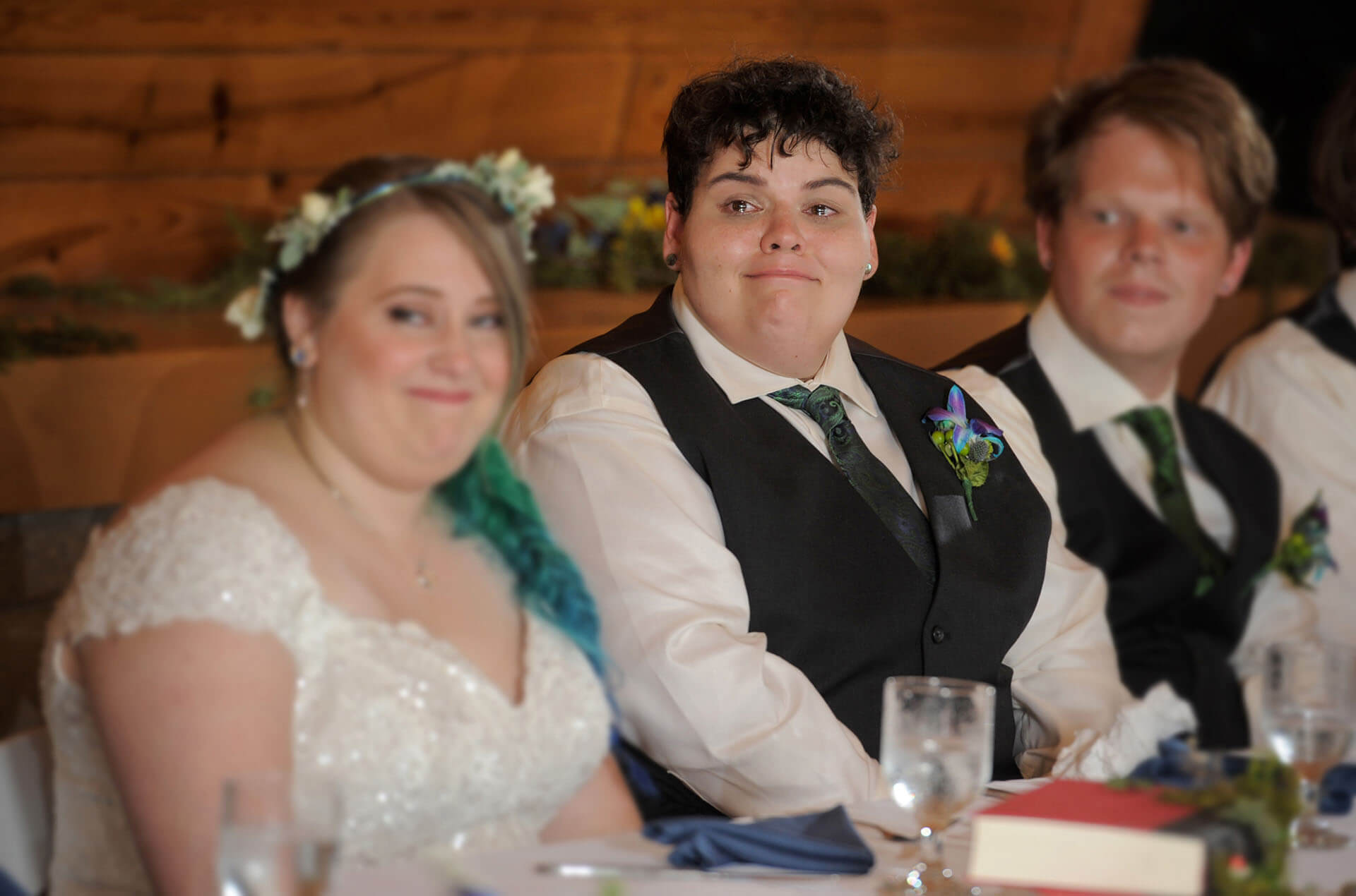 Non binary couple cry during speeches at Indian Springs Metro Park in White Lake Michigan.