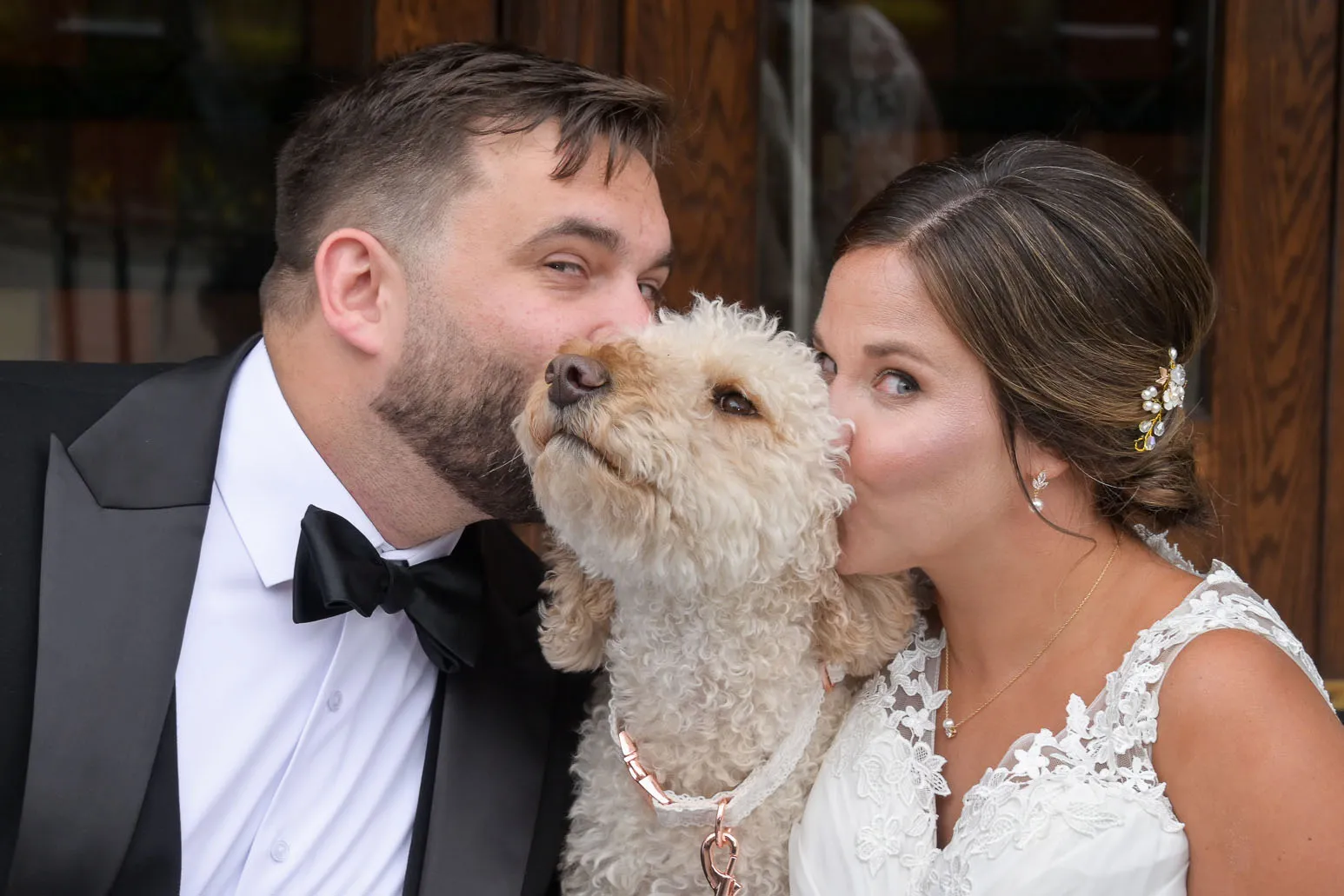 Wedding couple with their beloved dog at the historic Gem Theatre in Detroit, Michigan.
