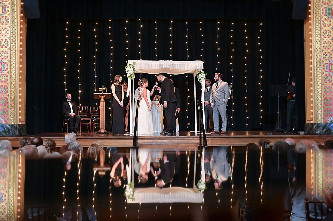 Love this combined Jewish and Catholic wedding ceremony at the Gem Theatre in Detroit, Michigan.
