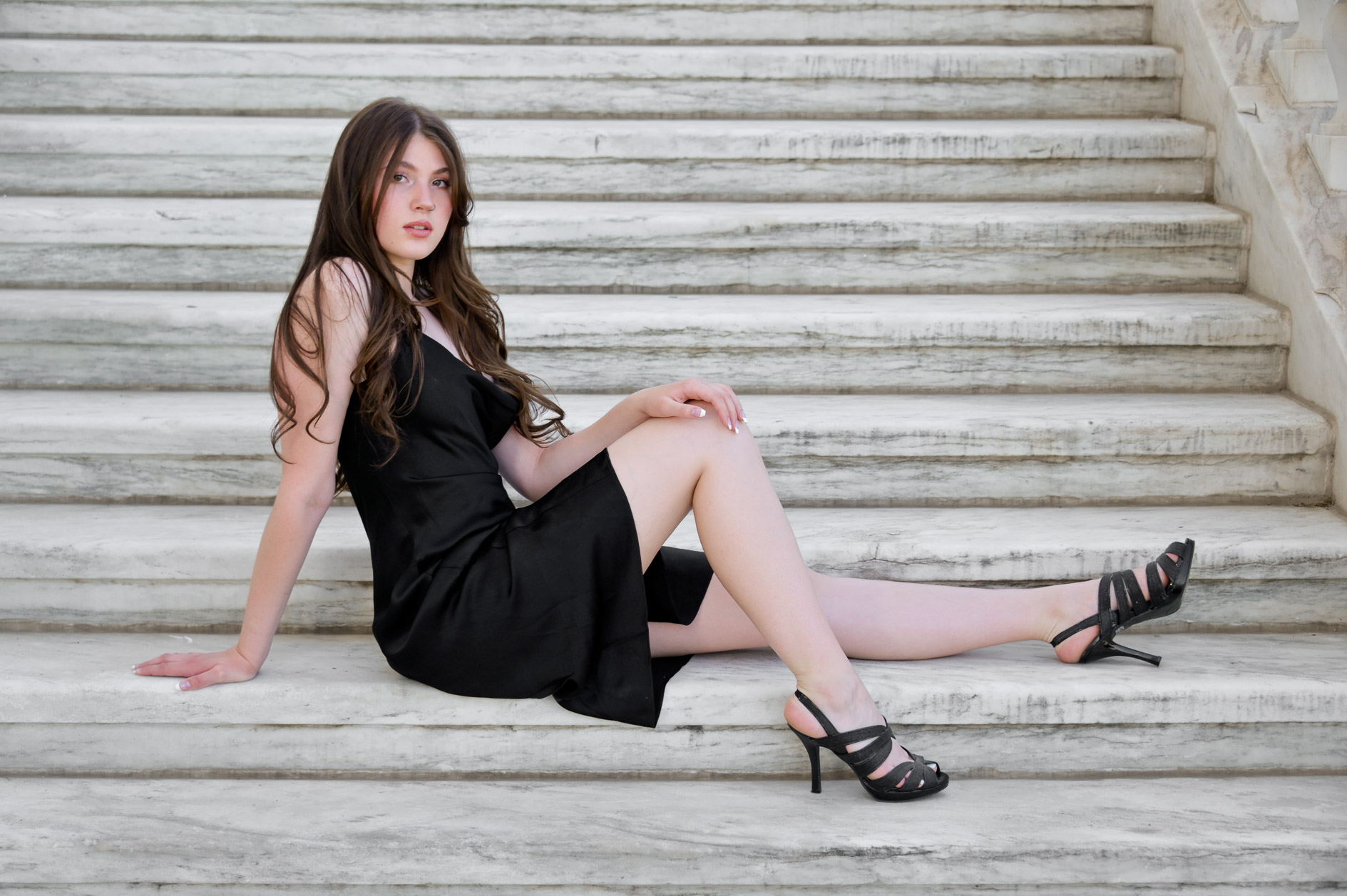 fraser High school student posing in Detroit for her senior pictures.