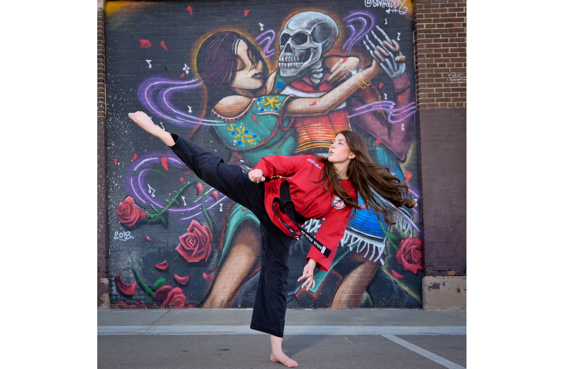 A more casual look for this high school graduate's senior photos downtown photos.