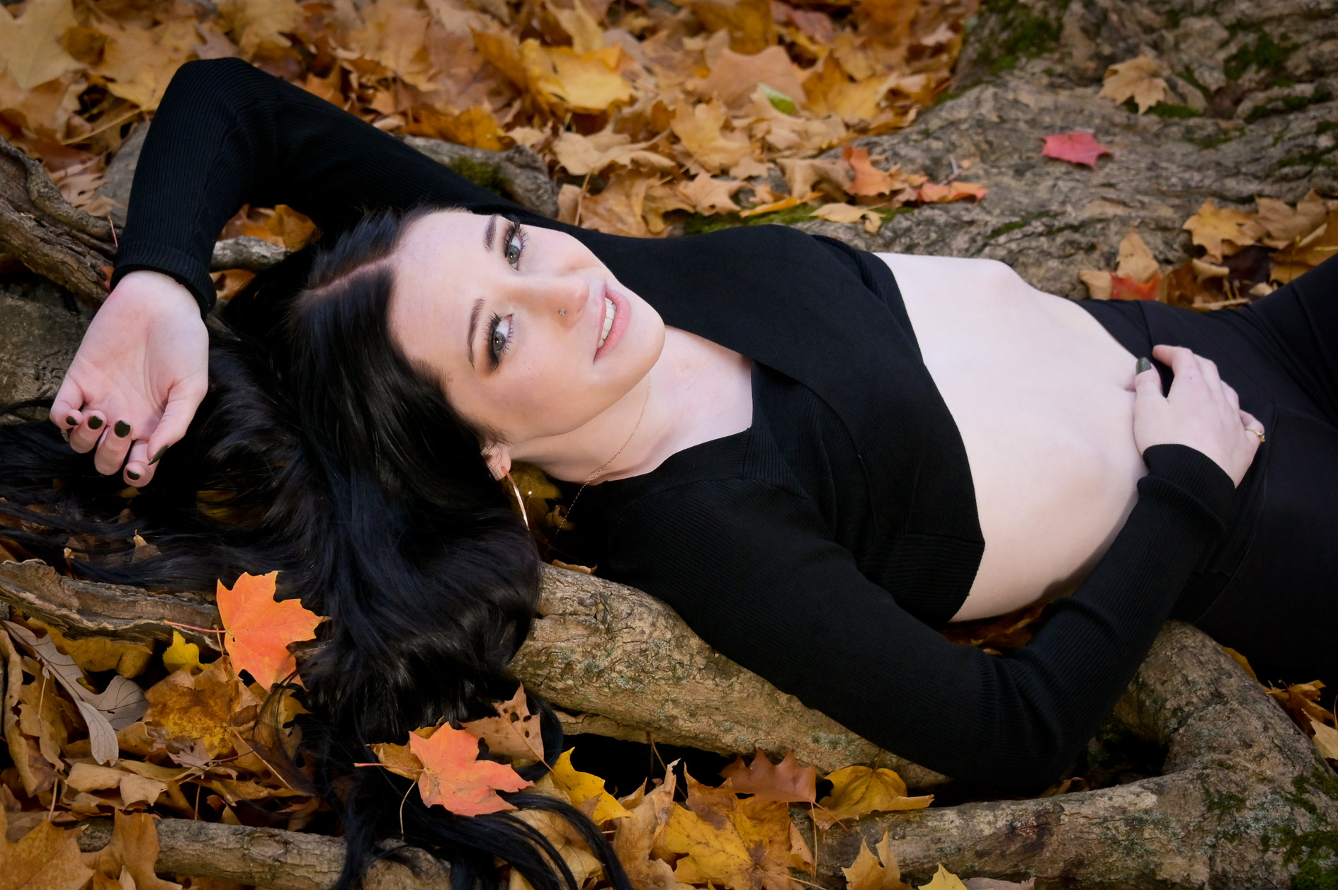 Troy, MI senior poses for this mature photo for her senior photo in fall colors.