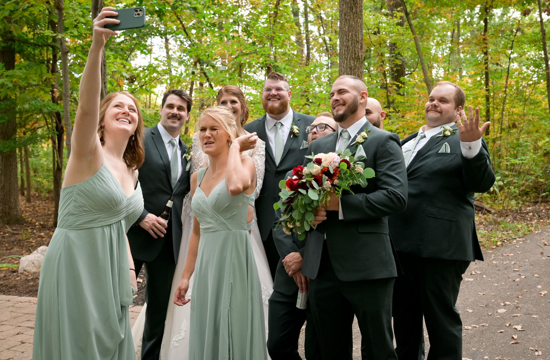 The wedding party in Grand Blanc, Michigan tries to pose for a group 