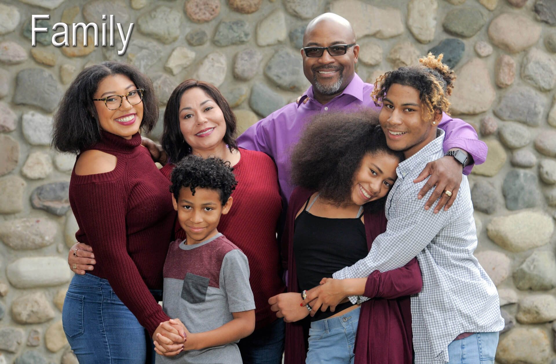 A family cuddles for this fun family photo in Auburn Hills, Michigan.