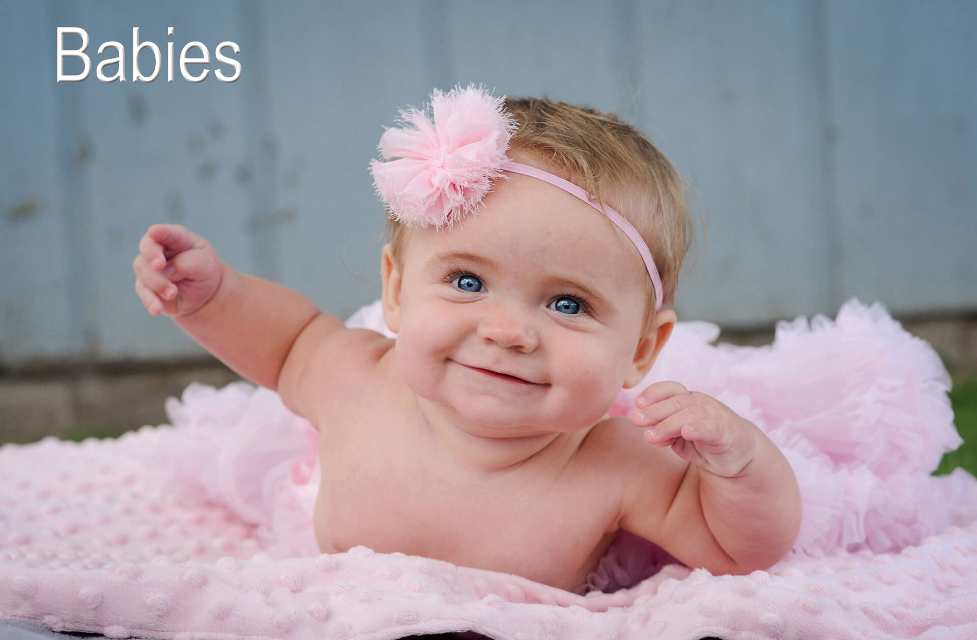 A little girl's sixth month photo session features a baby in Troy, Michigan in her tutu during best baby photographer Marci Curtis's Detroit baby photography session.