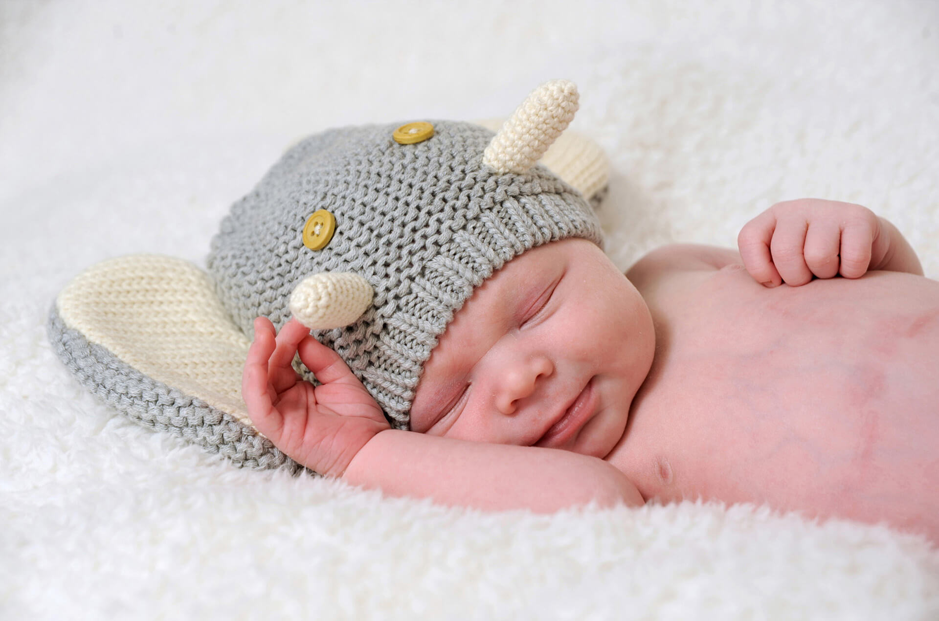 Best and most affordable newborn baby photography is usually photographed at my Troy, Michigan green studio.