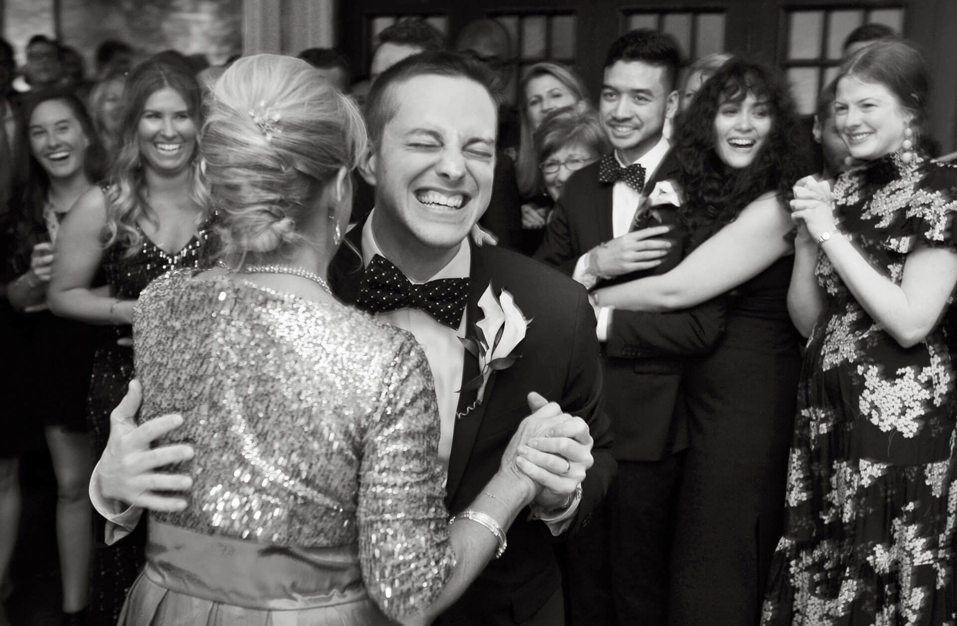 Fun, candid wedding photojournalism moments like this mother and son dance is what being able to capture spontaneous moments from weddings is what sets me apart from other wedding photographers.