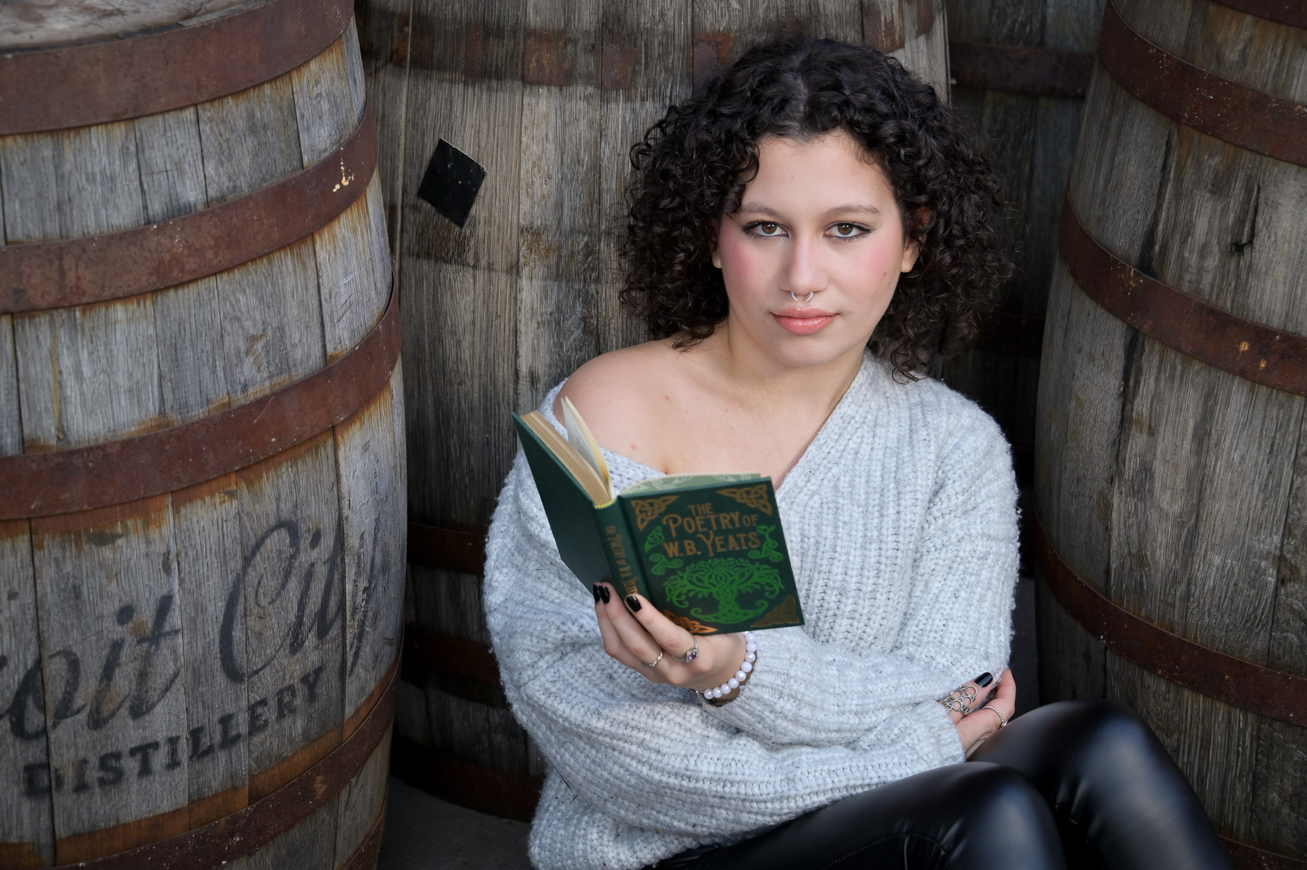Senior from Birmingham Groves reads her favorite poetry for her senior photos.