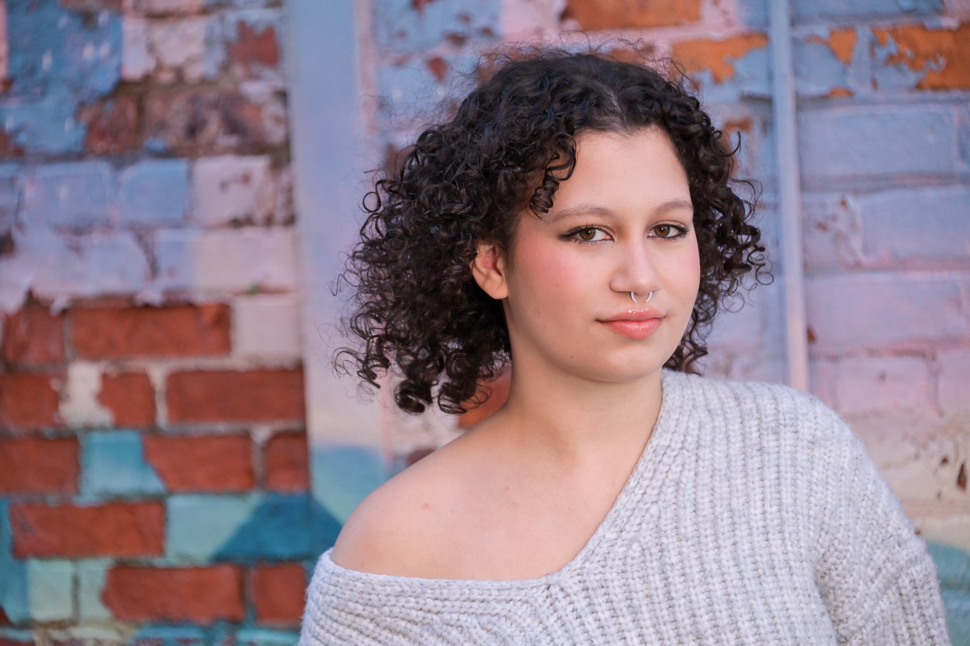 Senior during golden hour downtown Detroit for a warm glow.