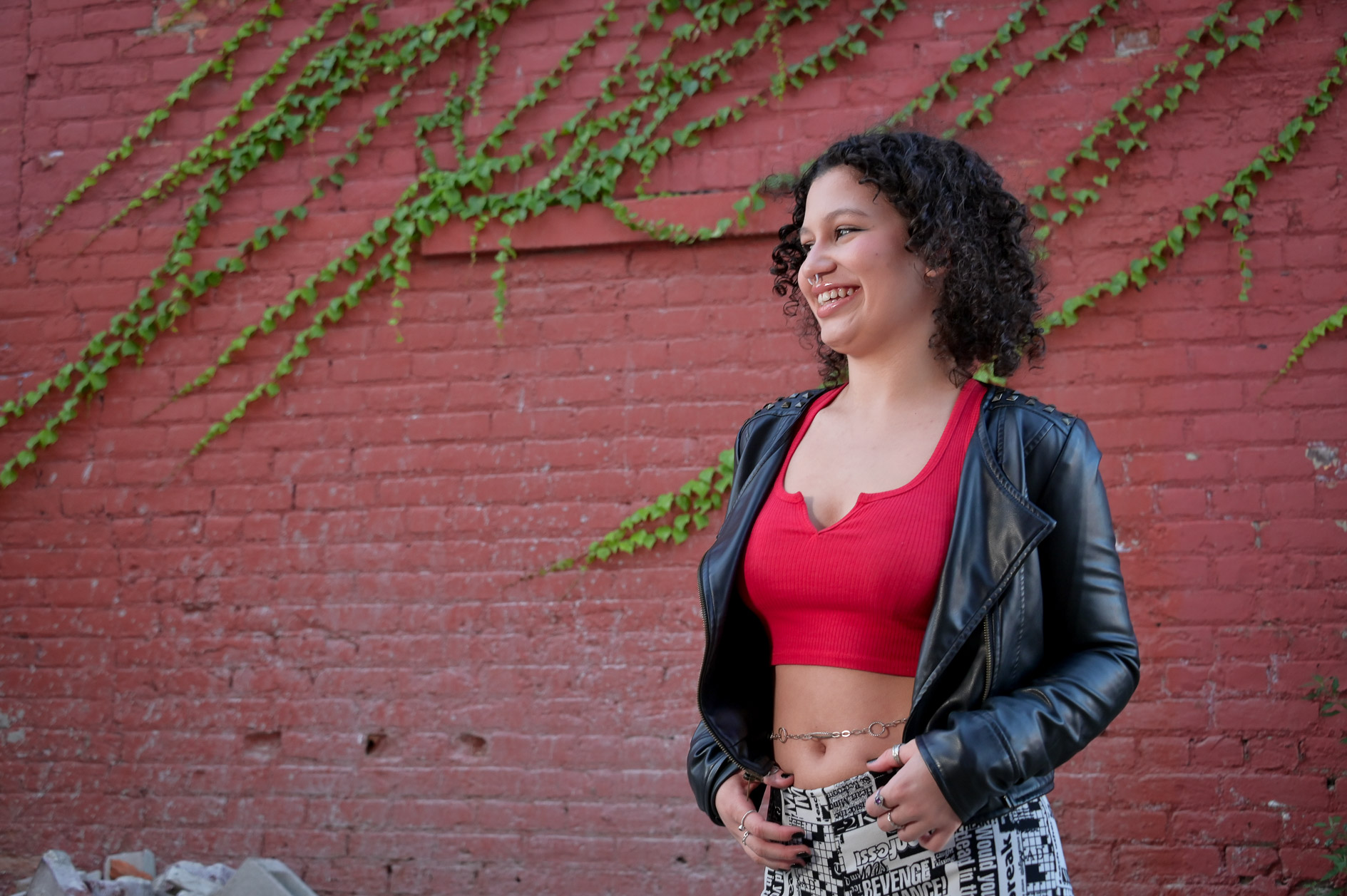 Senior from Groves High School in Birmingham, MI posing in an alley in Detroit for this drama filled portrait.