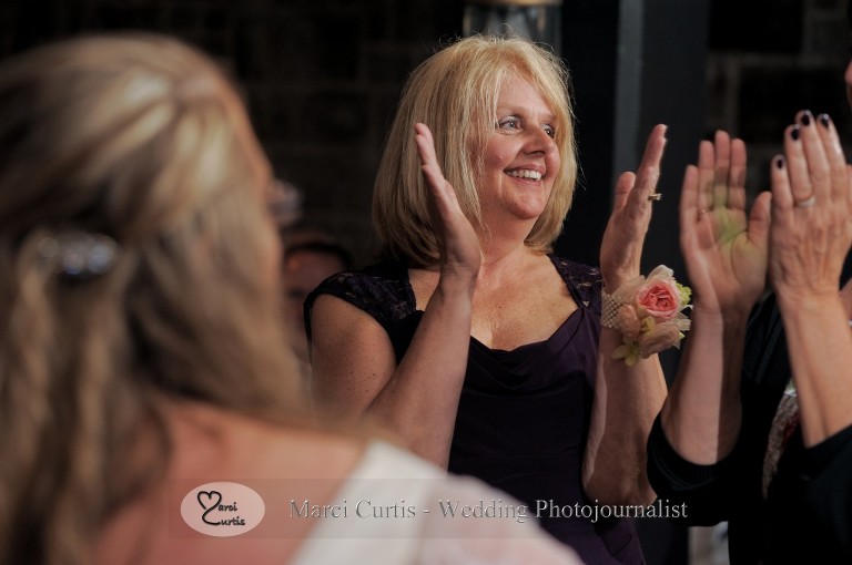 Dale's mom gets into the dancing during the wedding reception at Wellers Raisin River room in Saline, Michigan.