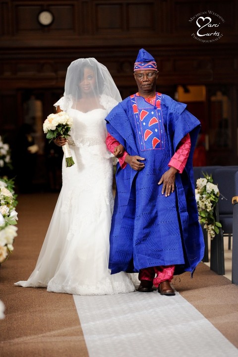 Detroit Nigerian Wedding Photographer photographs the bride's processional with her Nigerian father.