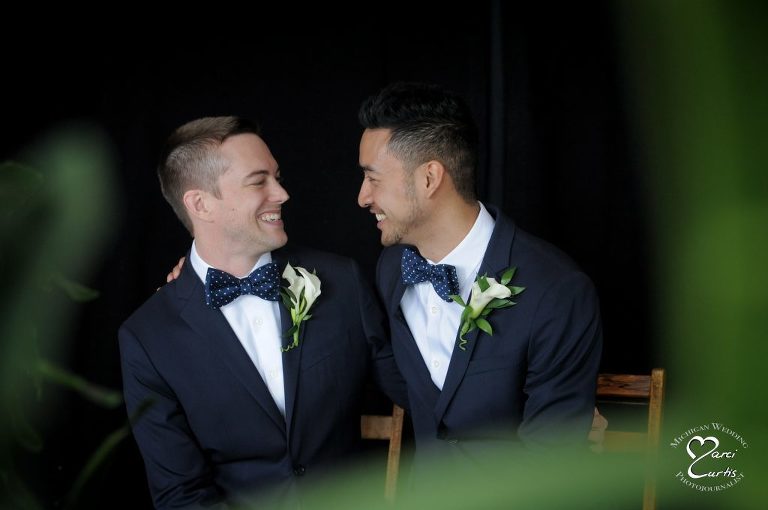Two grooms before their wedding ceremony at Jam Handy in Detroit.