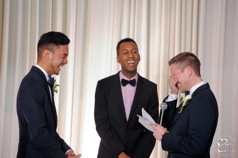 Groom reacts while reading his wedding vows in Detroit, Michigan at the Jam Handy.
