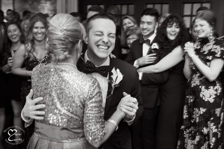 Mother and son dance at wedding in Jam Handy.