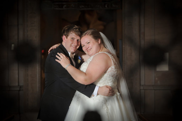 The bride and groom at the Detroit Public Library was our way to try to beat the July heat. Photo by Marci Curtis