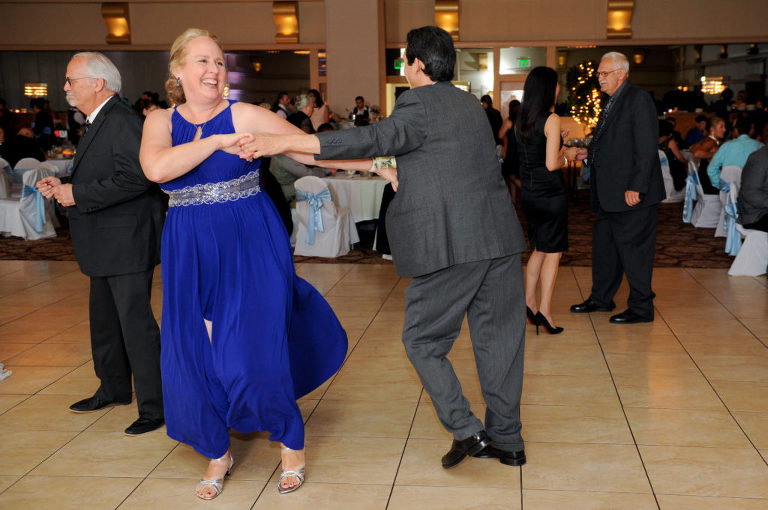 The bride's mother dances at the Royalty House wedding reception in Warren, Michigan. Photos by Marci Curtis