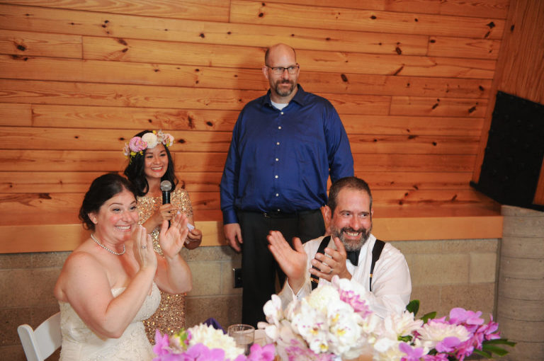 The toasts with the wedding party at the Indian Springs Metropark wedding in White Lake, Michigan.