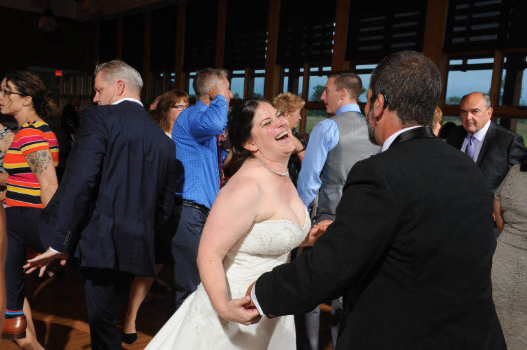 The bride and groom dance at the Environmental Discover Center at the Indian Springs Metropark in White Lake, Michigan.