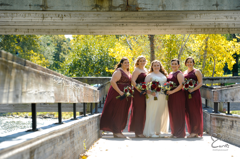 Bridesmaids in the fall. Ypsilanti Freighthouse wedding photography of the newly renovated historic building in Depot Town, Ypsilanti, Michigan.
