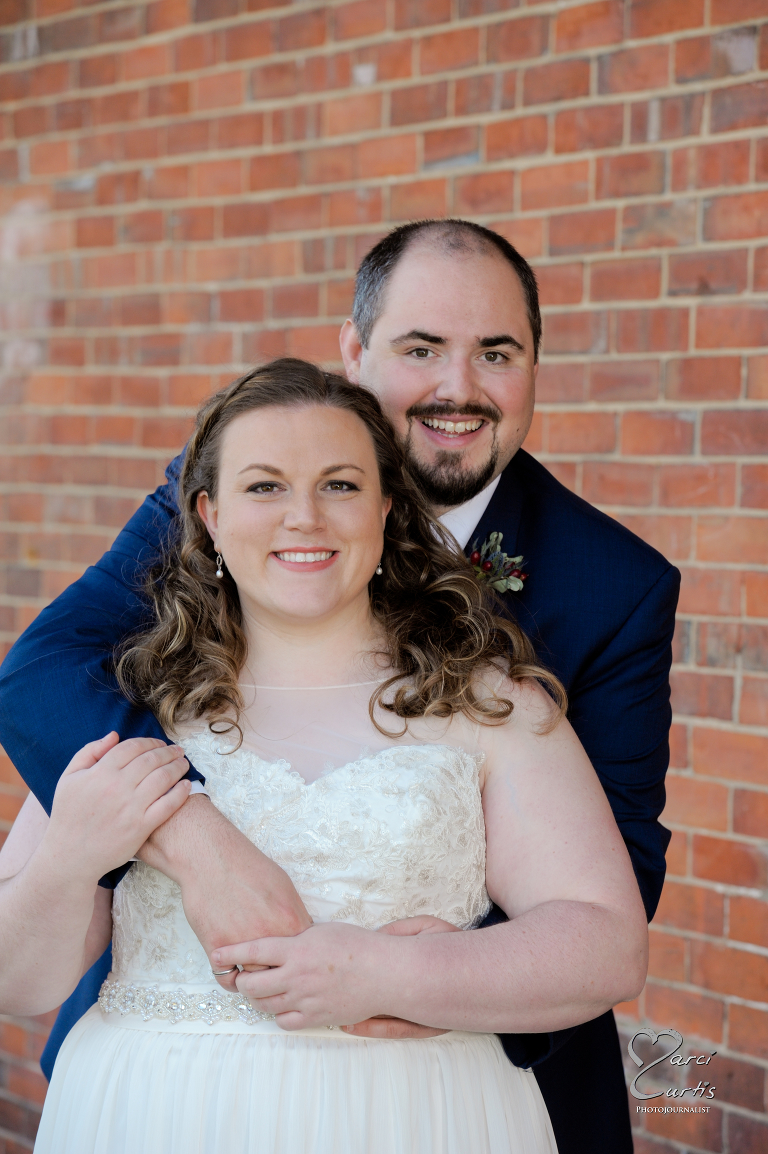 The bride and groom. Ypsilanti Freighthouse wedding photography of the newly renovated historic building in Depot Town, Ypsilanti, Michigan.