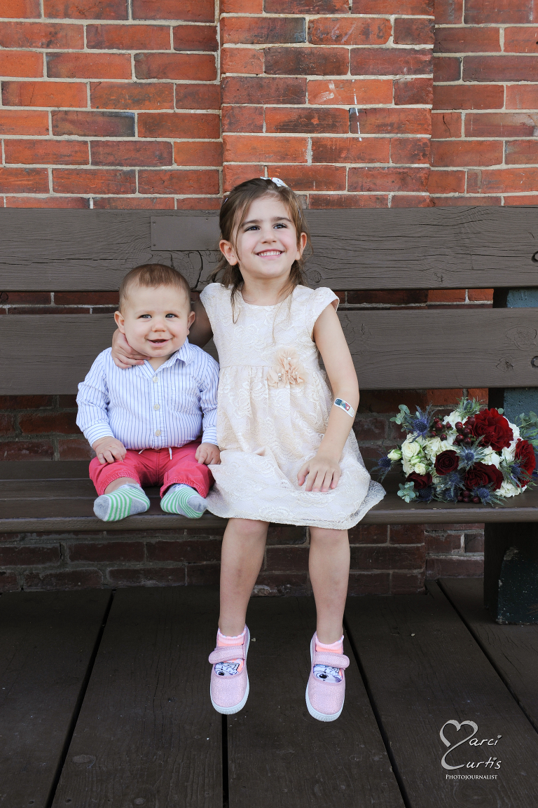Cute kids at the train station. Ypsilanti Freighthouse wedding photography of the newly renovated historic building in Depot Town, Ypsilanti, Michigan.