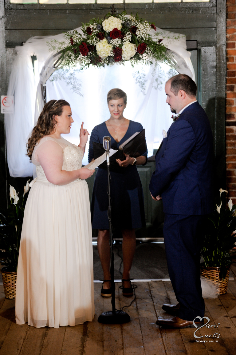 The intimate wedding ceremony.Ypsilanti Freighthouse wedding photography of the newly renovated historic building in Depot Town, Ypsilanti, Michigan.