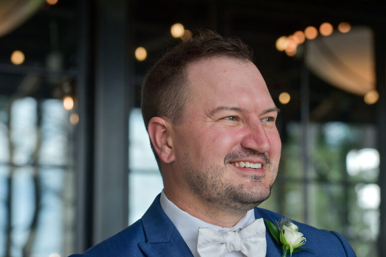 The groom watching golf at Shepherd's Hollow Golf Club in Clarkston, Michigan.